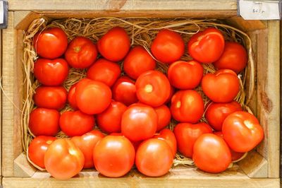 Wooden Box Full Of Red Tomatoes