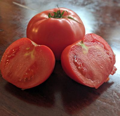 Whole And Sliced In Half Tomato