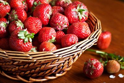 Wooden Basket Full of Red Strawberries