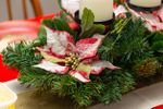 Christmas Centerpiece Of Pine And Poinsettia Flowers