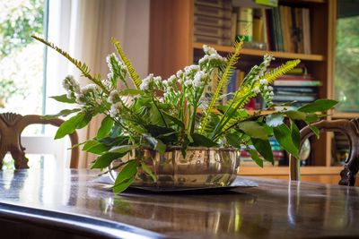 Plants Used As A Centerpiece On A Table