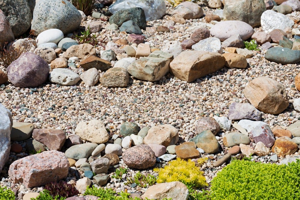 Caring For A Rock Garden Bed How To, How To Lay Garden Rocks