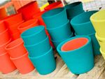 Stacks Of Brightly Colored Pots