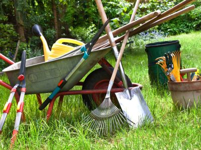 Metal Wheelbarrow Filled With Gardening Tools