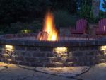 Backyard Fire Pit With Lit Fire