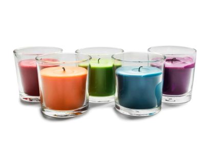 Different Colored Candles In Glass Jars