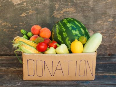 Cardboard Donation Box Full Of Fruits And Vegetables