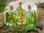 Glass Bottles Of Herb Infused Vinegar