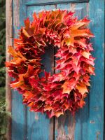 DIY Autumn Leaf Wreath Hanging On A Blue Door
