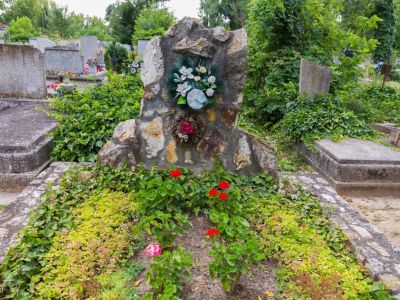 Planted Flowers On A Grave