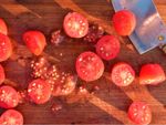 Tomatoes Cut In Half And Tomato Seeds