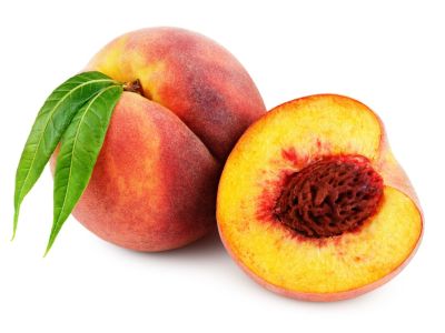 Whole And Sliced Open Peach Showing The Pit
