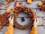 Person Making A Fall DIY Honeysuckle Wreath