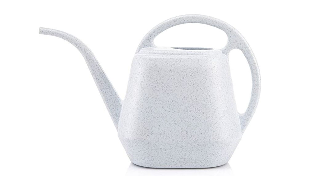 A white plastic speckled watering can.