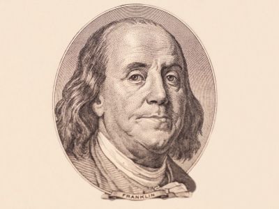 A sepia toned portrait of Benjamin Franklin
