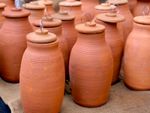 Olla water pots being prepared for winter storage